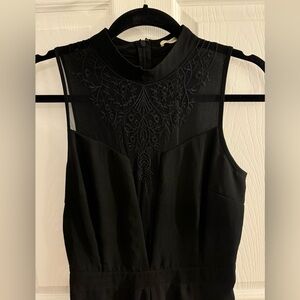 Black jumpsuit with cutouts